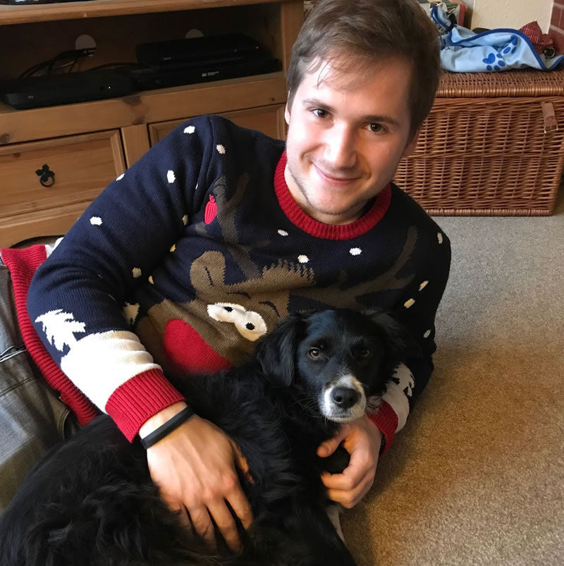 Andy and vegan dog Ruff at Christmastime