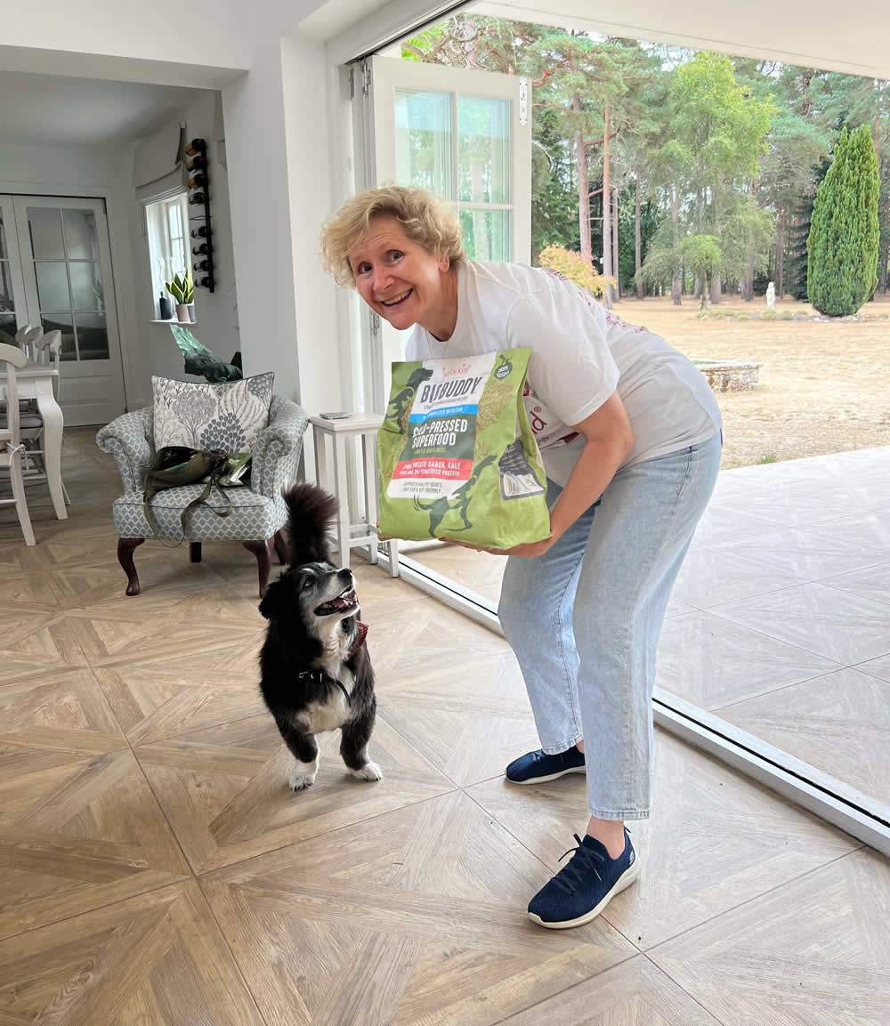 Dr Arielle with a bag of BioBuddy and plant powered family dog Ruff