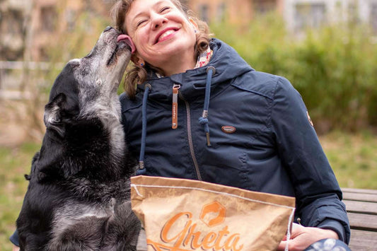 Leni Lecker and Eddie with Greta dog food