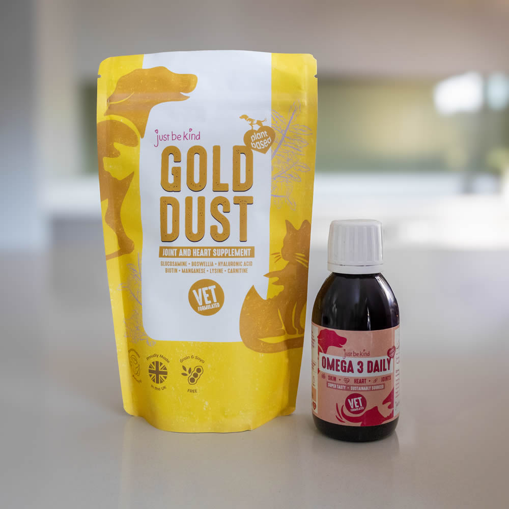 Yellow sustainable package labelled 'Gold Dust' and a bottle of 'Omega 3 Daily' on kithcen table