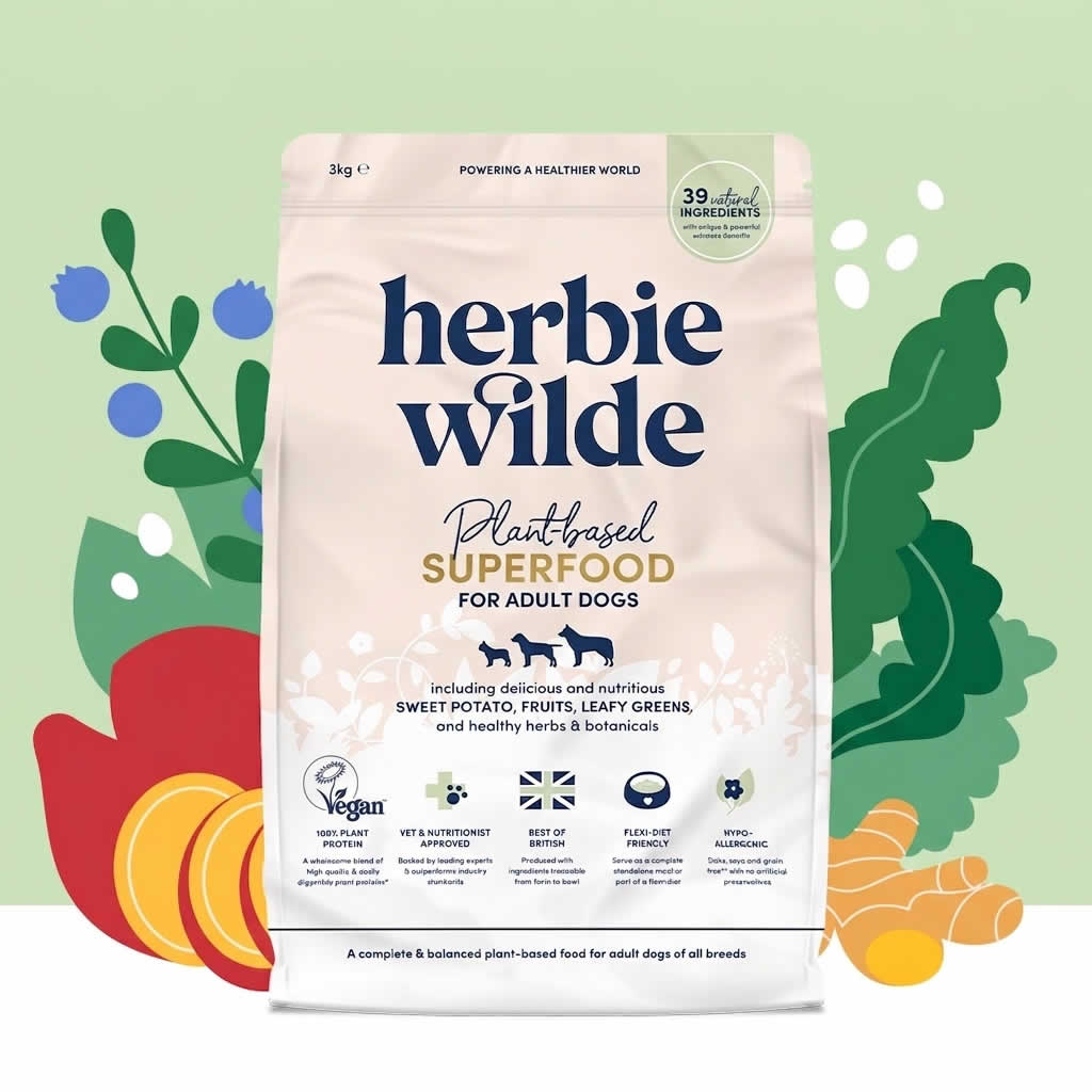 Herbie Wilde plant-based superfood for adult dogs packaging on a green background with decorative elements.