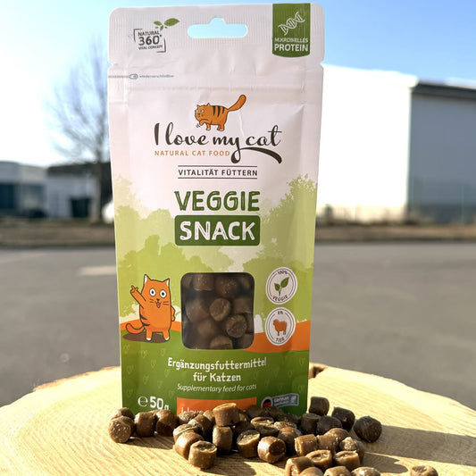 Veggie snack package for cats with snacks on a wooden surface  - chewy cat treats made with microbial fermentation protein